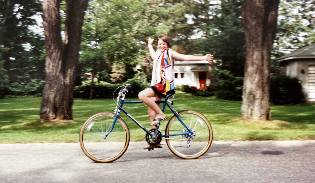 Spring Creative Inc's founder Fern Sabo on a bicycle